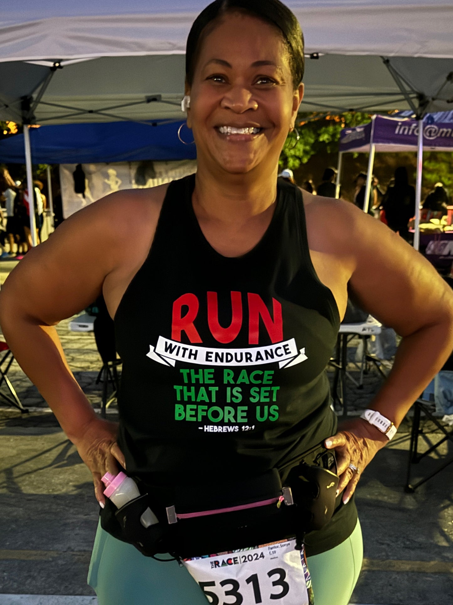 Runner in black Run with Endurance Racerback Tank 